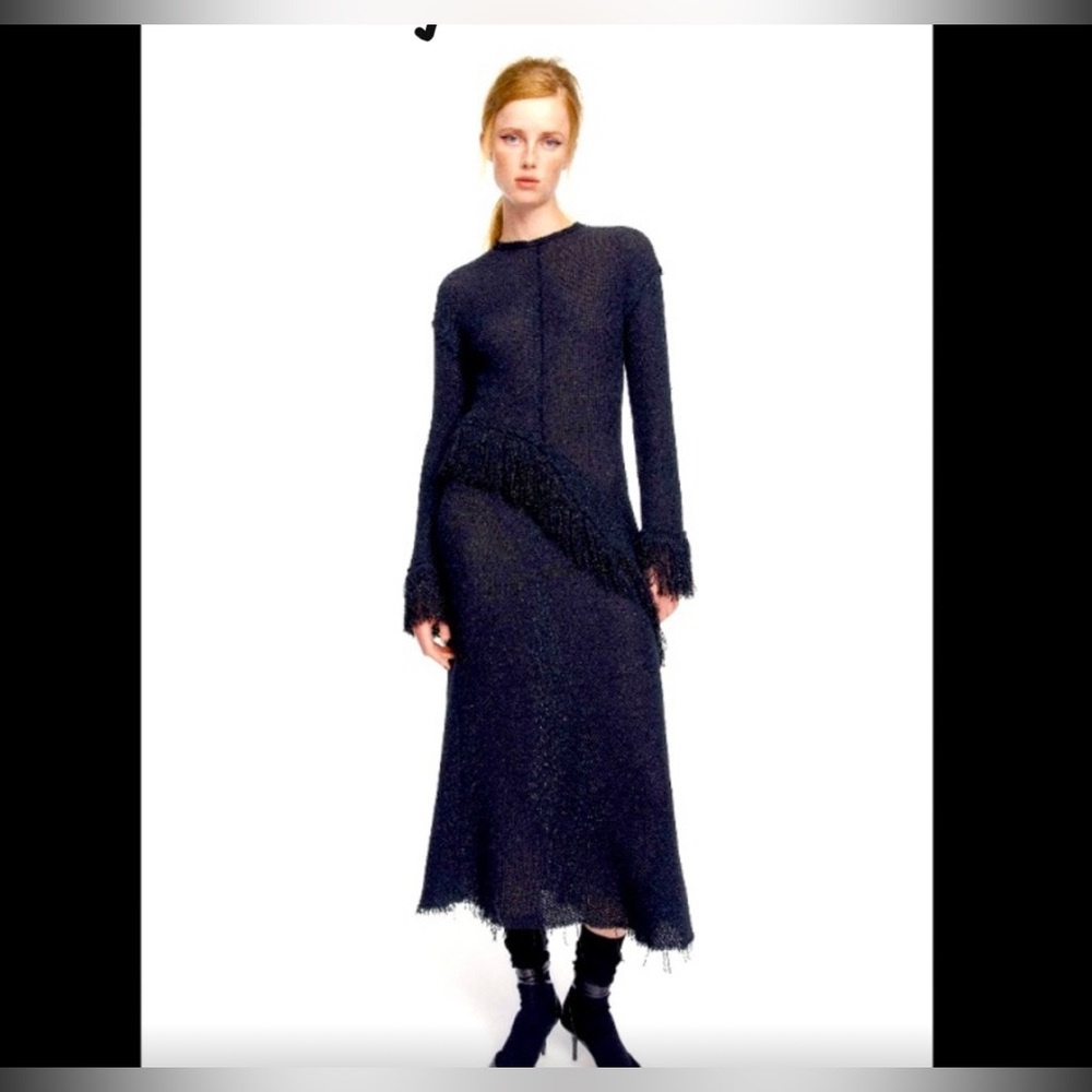 Effortlessly sophisticated black Zara dress. Knitted, frills